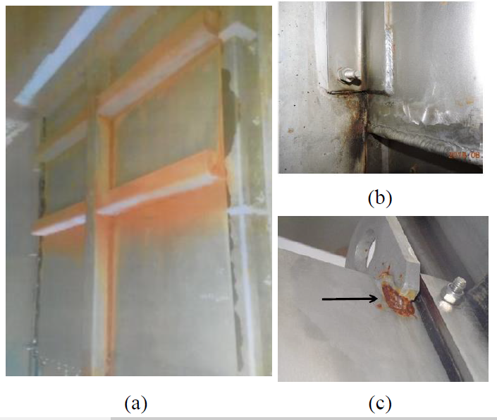 Indication of corrosion at welds in slide gates of the water treatment plant: (a) General corrosion in the slide gates stiffeners, (b) Corrosion at fillet welds and (c) Corrosion at fillet weld in lifting lugs.